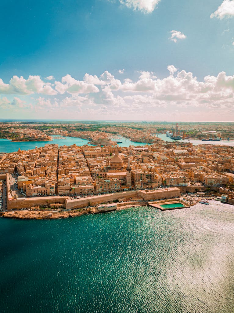 Stunning aerial view of Valletta, Malta, showcasing its historic architecture and coastal beauty.